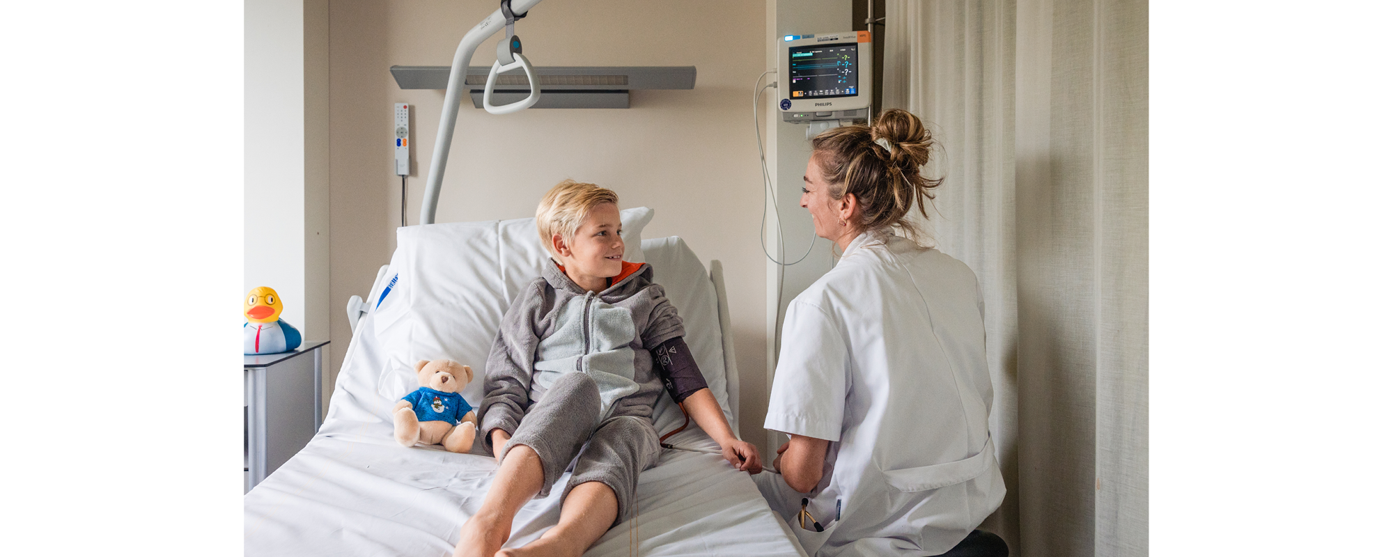 Foto van medewerker en patient 